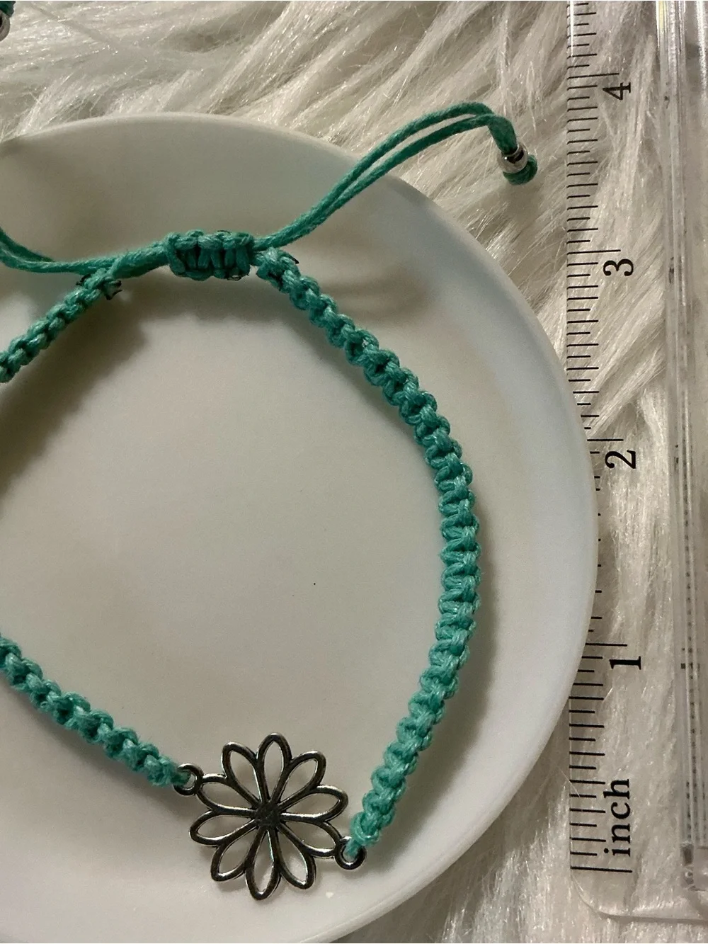 Pretty blue floral charm string bracelet